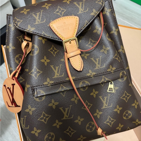 LV montsouris NM backpack. Good as new. Used atleast 3x only. - Picture 4 of 5
